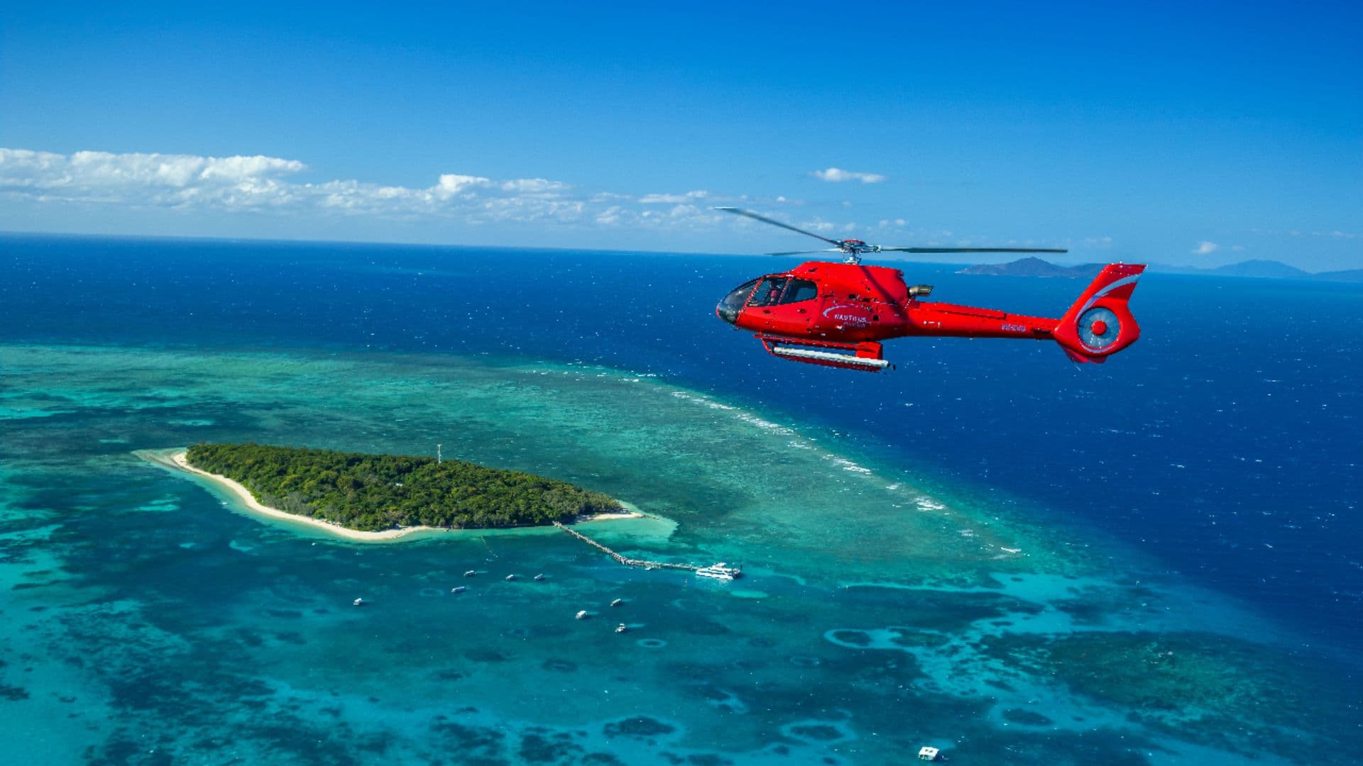 Take a breathtaking helicopter ride over the majestic 12 Apostles along the Great Ocean Road, offering a unique perspective of these magnificent rock formations.