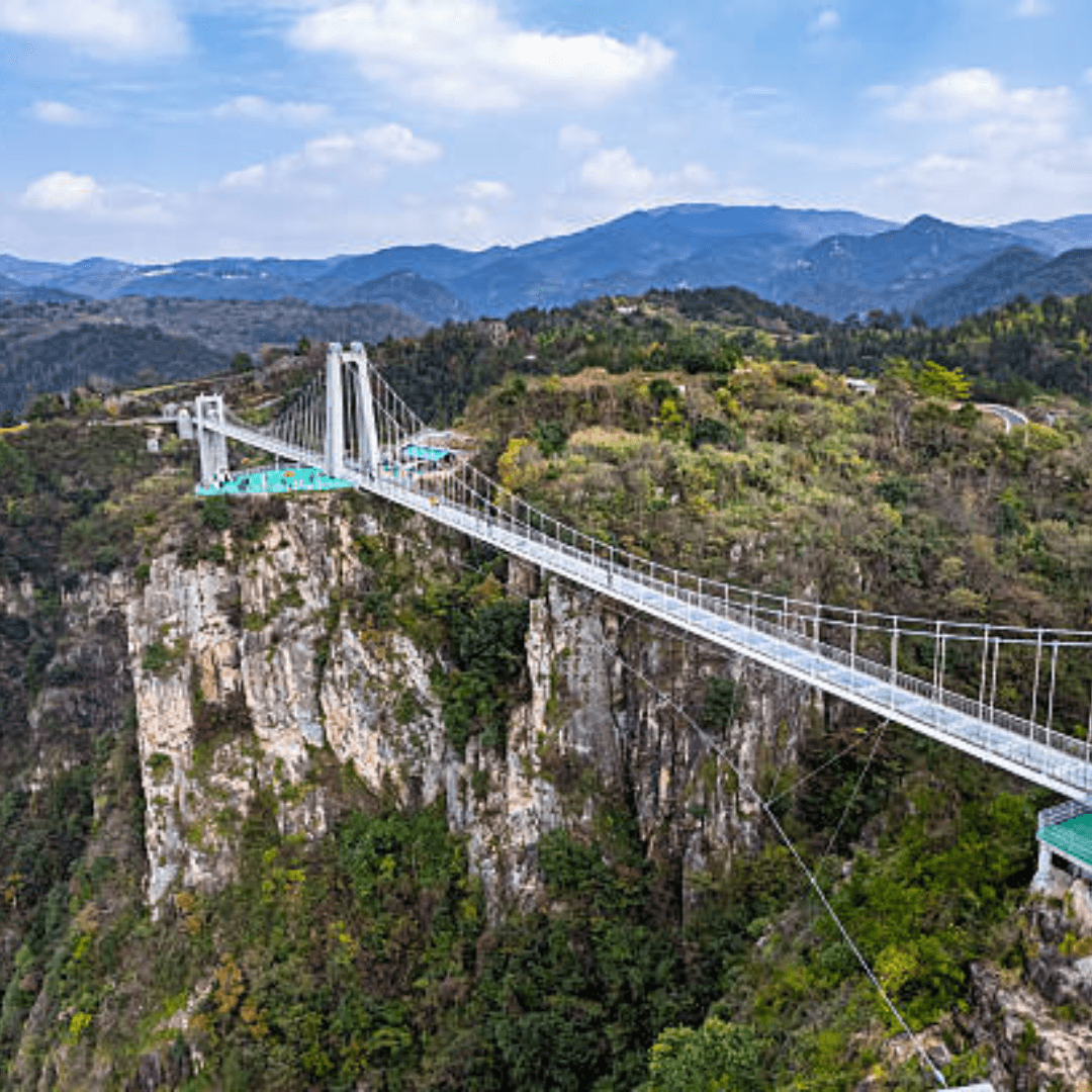 Walk above the clouds on China’s famous Glass Bridge — a thrilling skywalk suspended between towering cliffs, offering breathtaking views, heart-pounding excitement, and an unforgettable experience high above the ground.