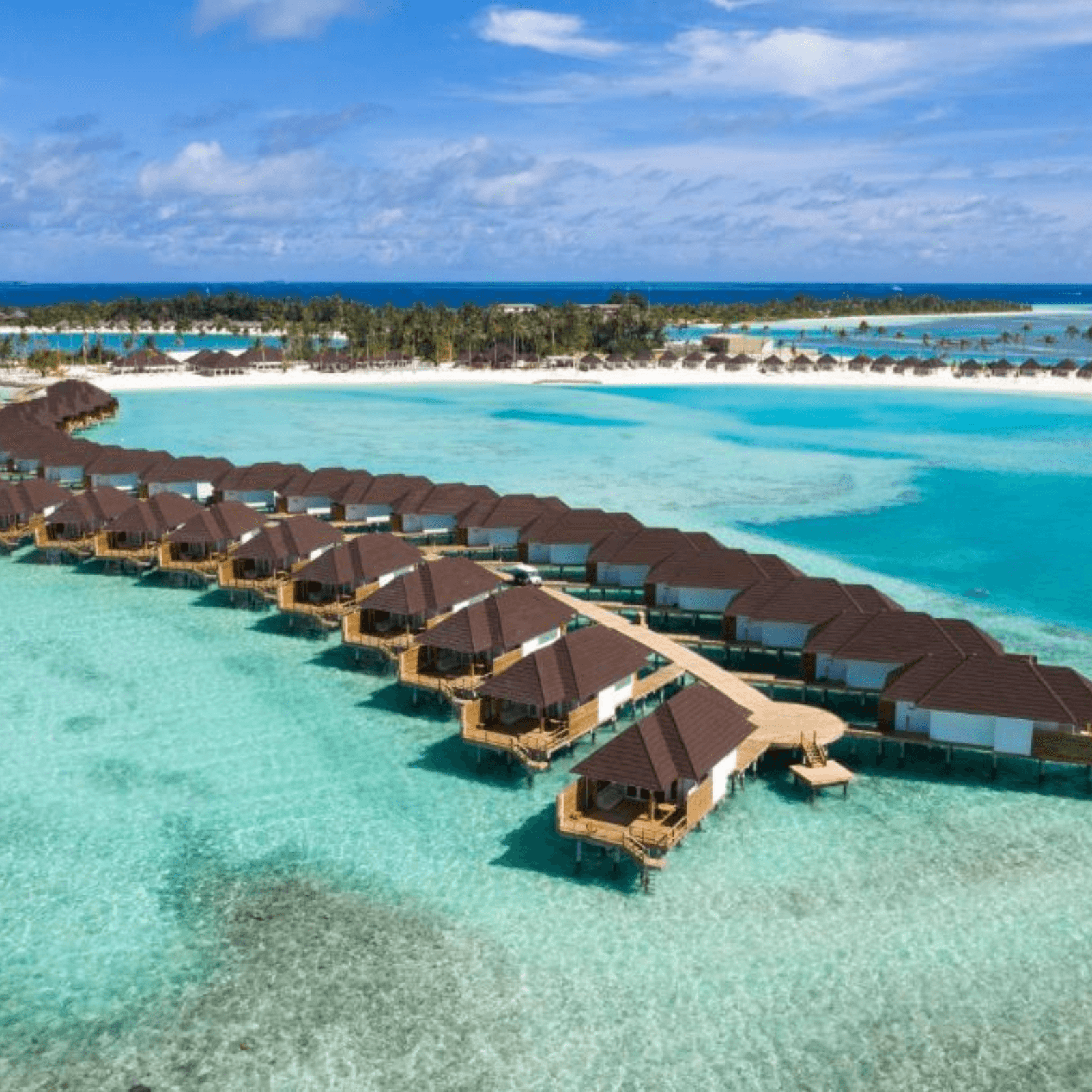 Stay in a luxurious overwater bungalow with breathtaking views.