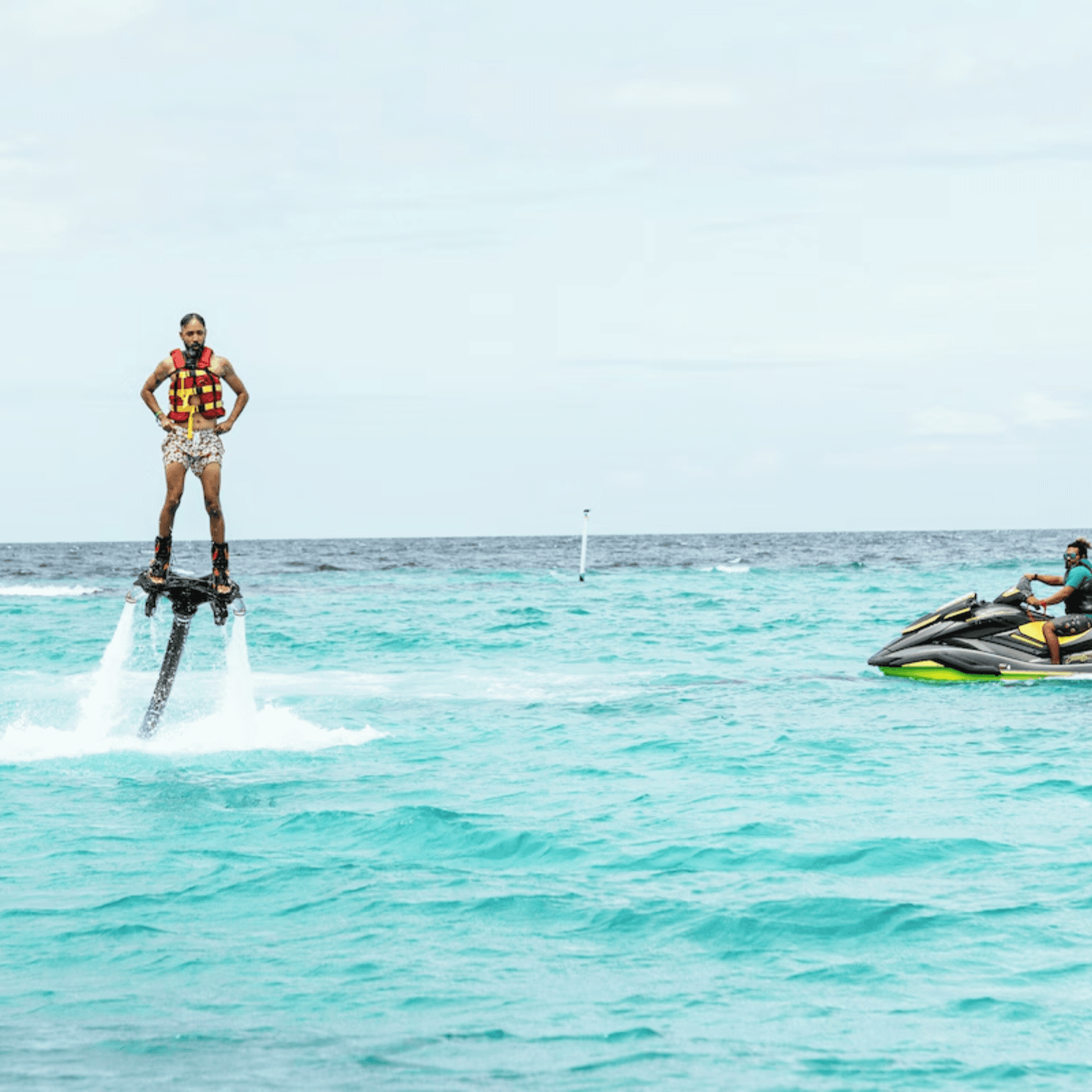 Enjoying thrilling water sports such as jet skiing, windsurfing, or paddleboarding