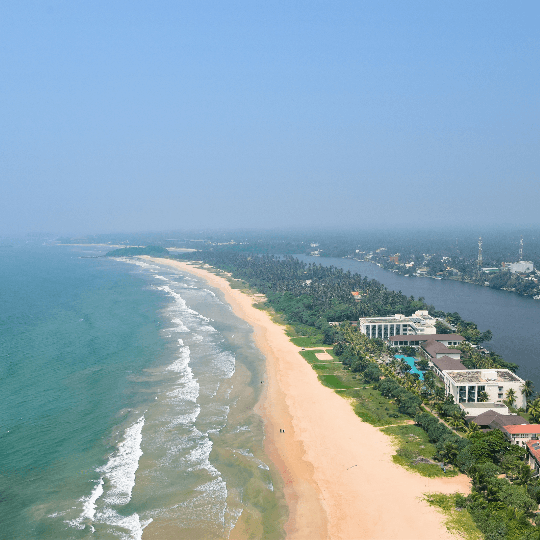 Relax on the pristine sands of Marble Beach in Trincomalee, where the azure waters invite you for a swim or a snorkeling adventure in one of Sri Lanka's most scenic coastal spots.