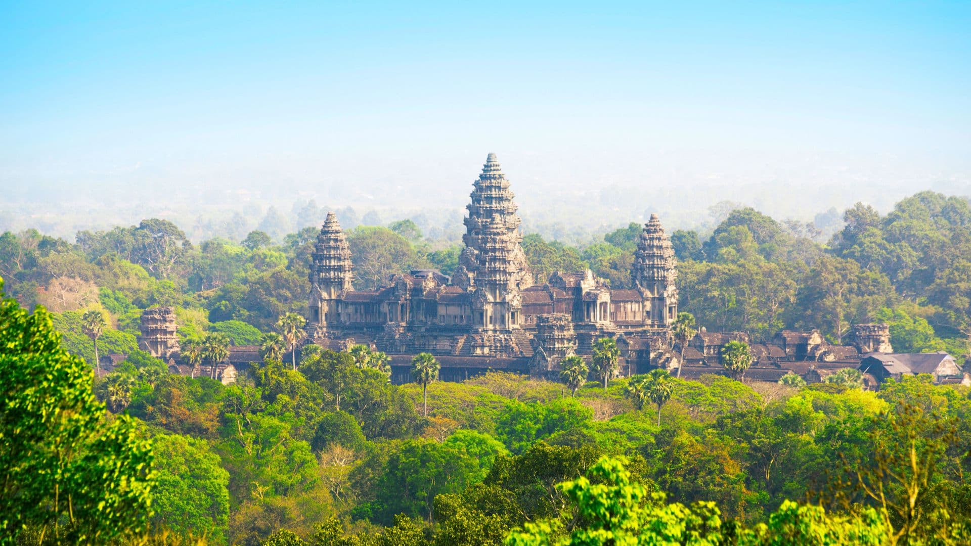 Angkor Wat Exploration – Discover the architectural brilliance of Angkor Wat, the largest religious monument in the world. Marvel at its intricate carvings, explore the ancient ruins, and enjoy a mesmerizing sunset from Bakheng Hill.