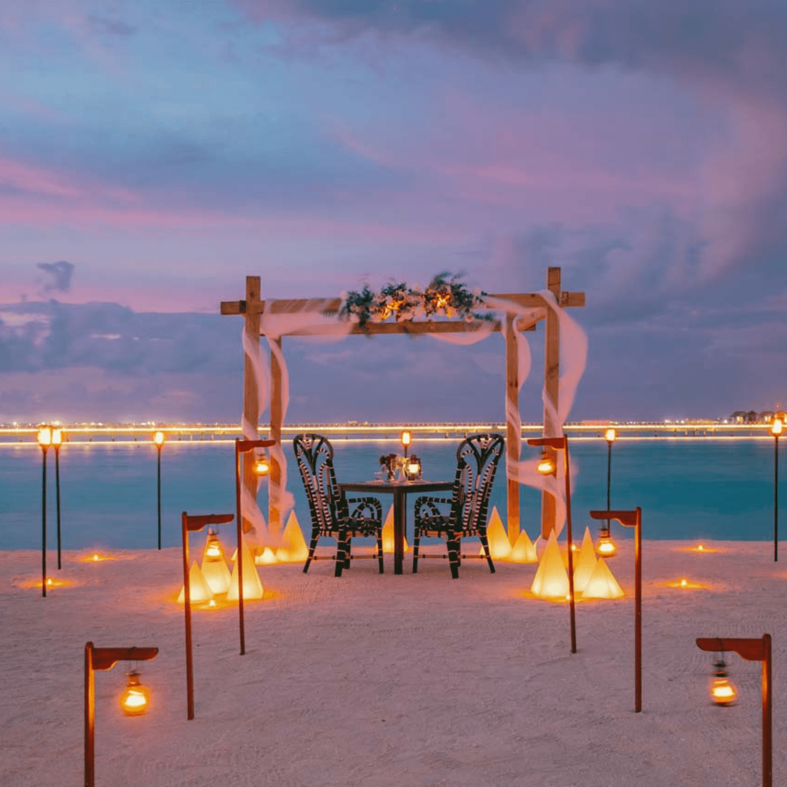 Experience a romantic candlelight dinner on the beach.