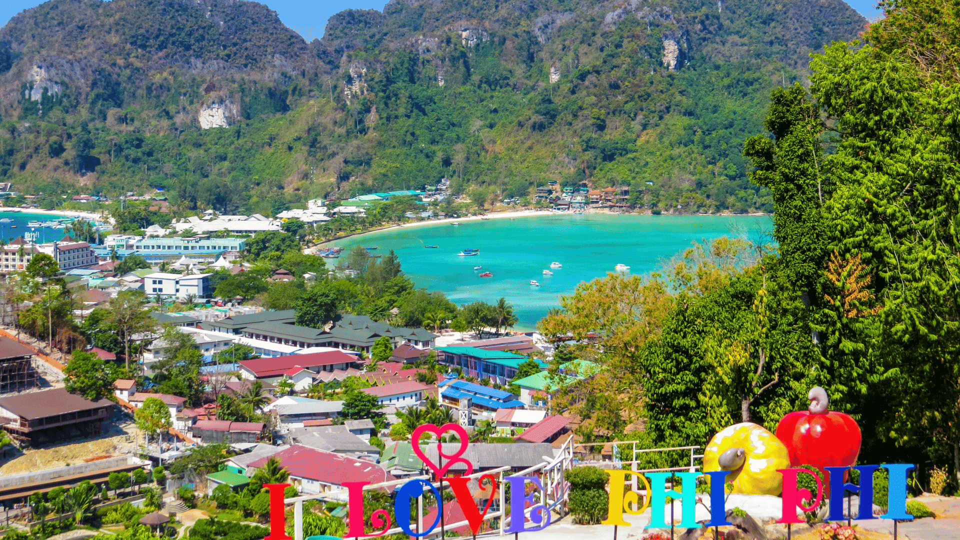 Relax and unwind on the sandy beaches of Phi Phi Islands, a pristine paradise in Thailand, known for its crystal-clear waters and vibrant marine life, making it a perfect spot for snorkeling and photography.