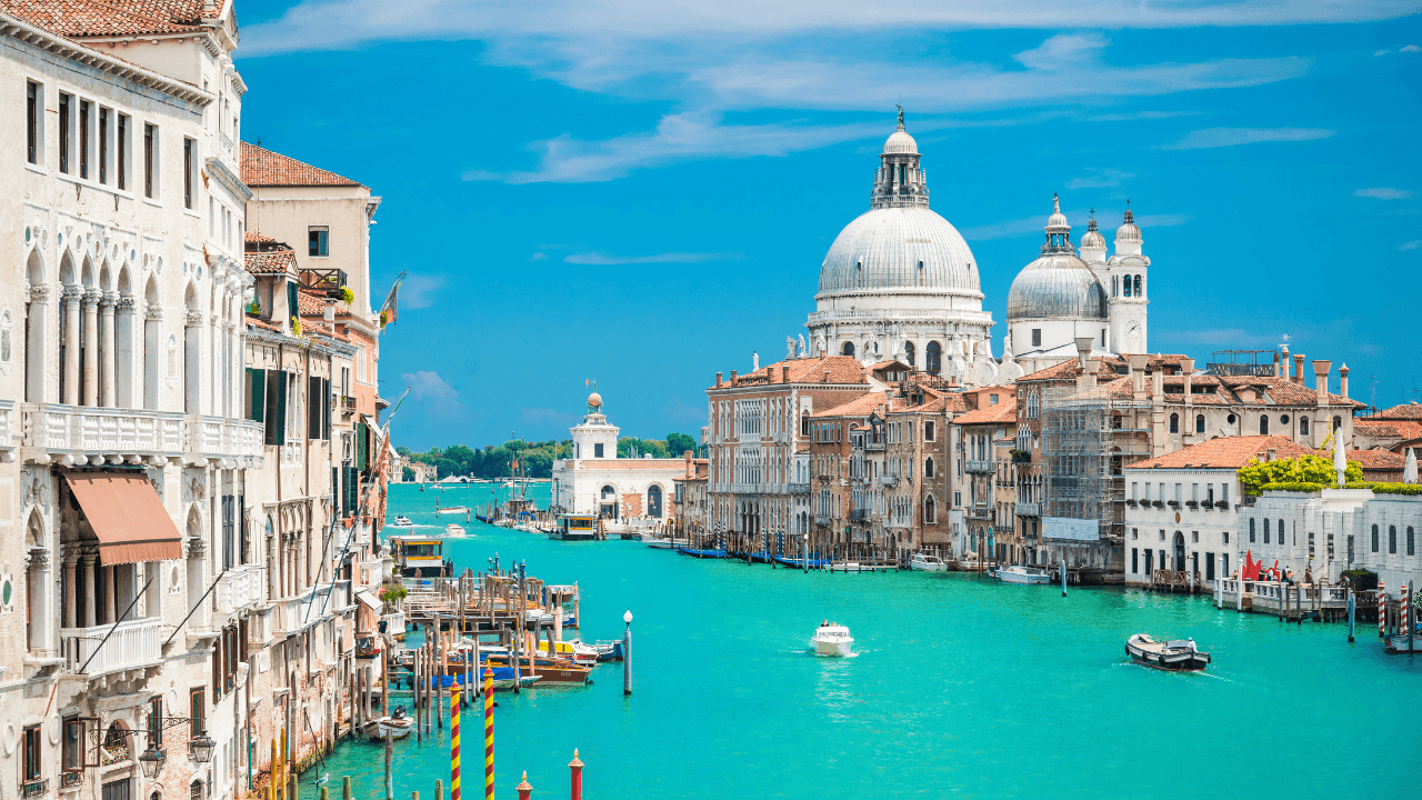 Venice, the enchanting “City of Canals,” is renowned for its romantic gondola rides, stunning architecture, and rich history. Built on a network of 118 islands, it features iconic landmarks like St. Mark’s Square, the Grand Canal, and the Rialto Bridge, making it one of the most magical destinations in the world.