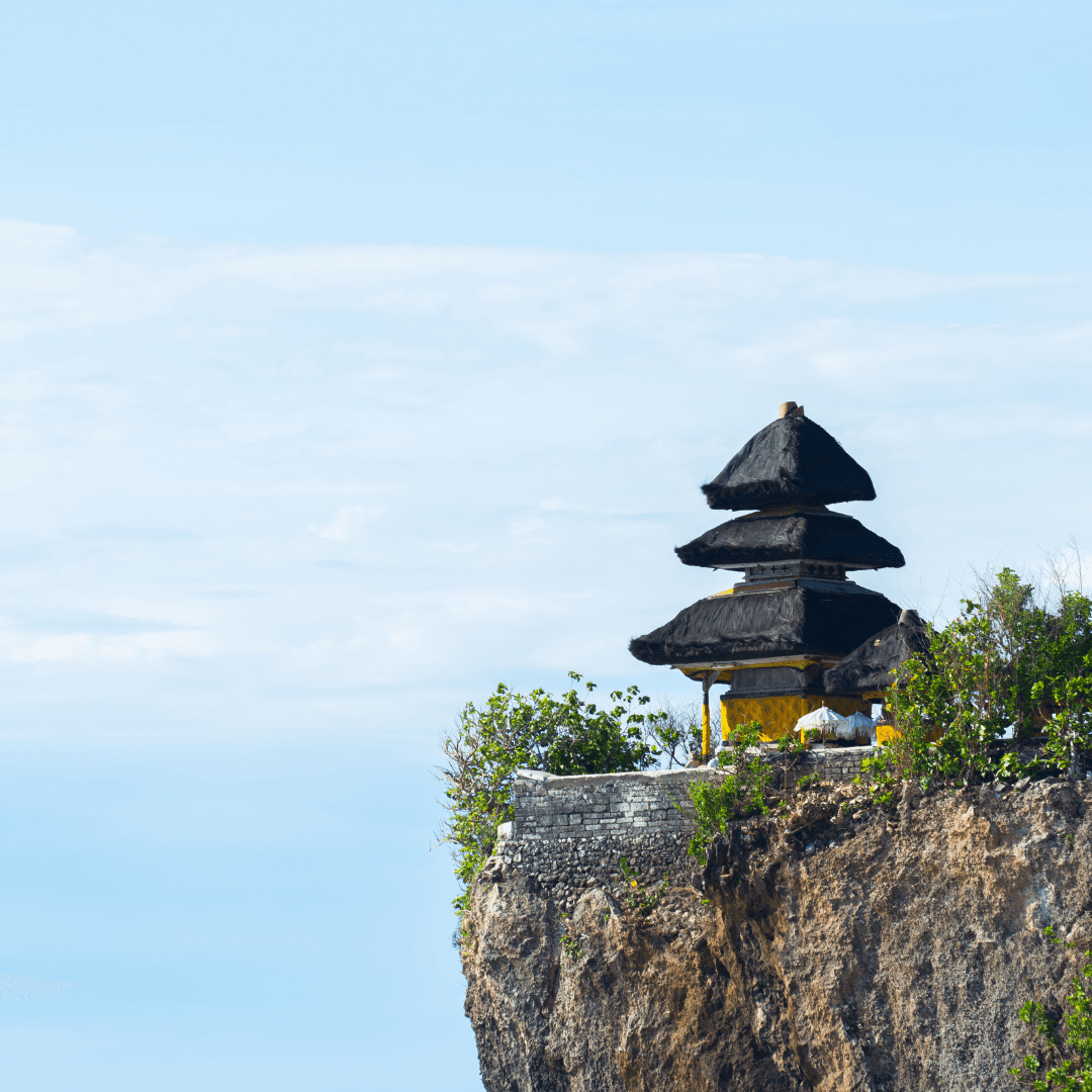 Uluwatu Temple: Witness stunning ocean views and a dramatic sunset from a cliffside temple.